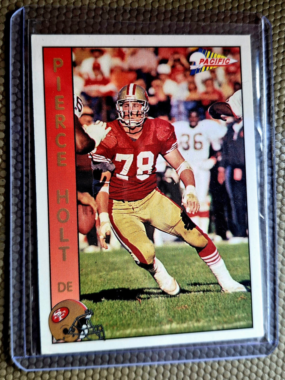 Pacific Football Trading Card - Red & Gold Pierce Holt Rookie Card